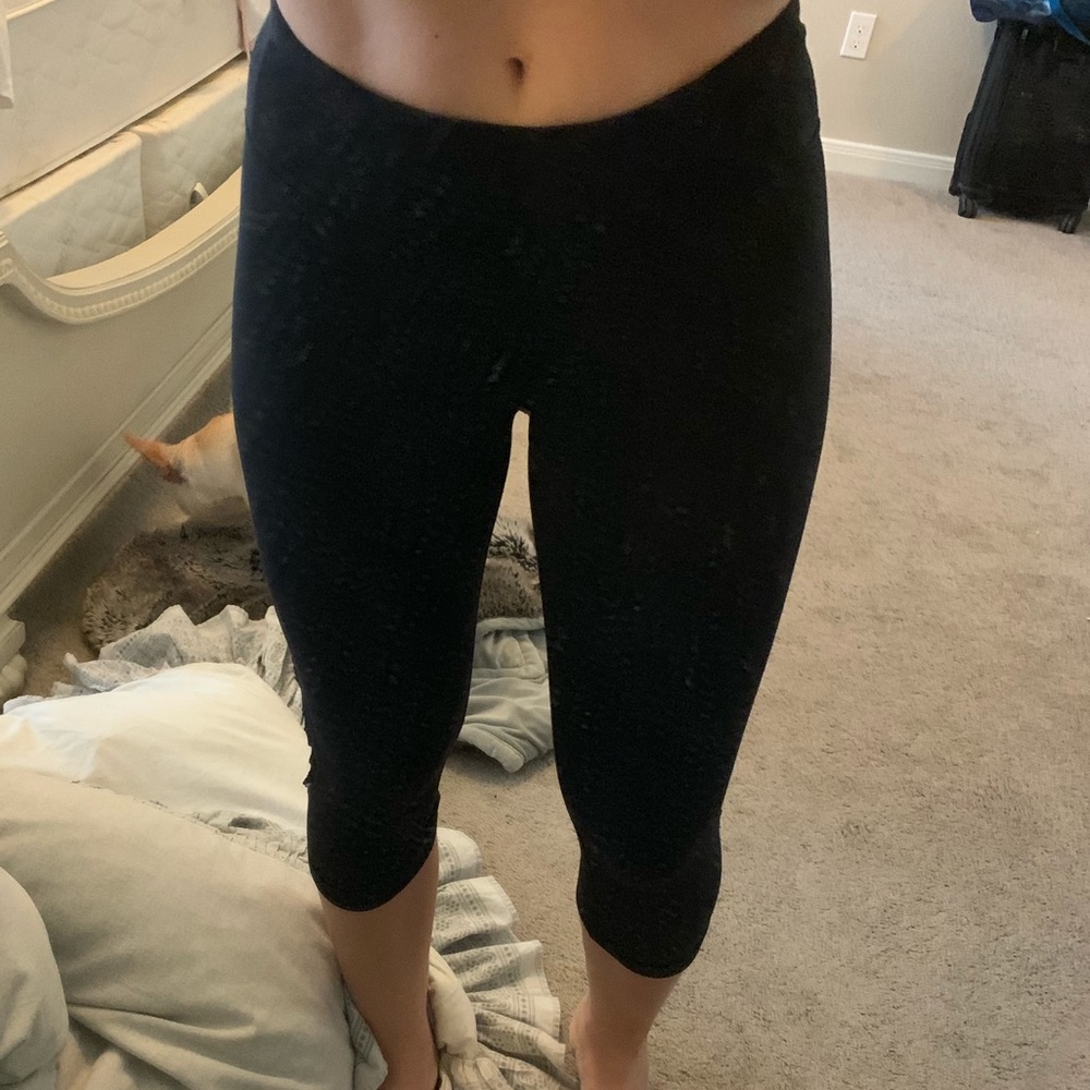 Black cropped Lulus with little ruffle on the side